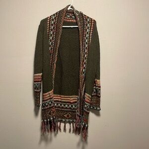 Selling a gently used green cardigan that has only been worn a few times.